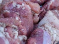 Closeup view of raw meat pieces, marinated with salt and pepper Royalty Free Stock Photo