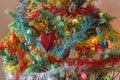 Closeup view with a red heart of hope for Christmas