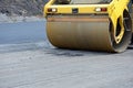 Closeup View on the road roller working on the new road construction site. Road repair Royalty Free Stock Photo