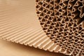 Closeup view of roll of brown corrugated cardboard Royalty Free Stock Photo