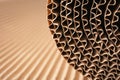 Closeup view of roll of brown corrugated cardboard, space for text. Royalty Free Stock Photo