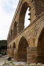 Closeup view of Roman built Pont du Gard aqueduct, Vers-Pont-du-Gard in South of France. Royalty Free Stock Photo