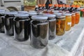Closeup view of a selection of fruit preserves in jars Royalty Free Stock Photo