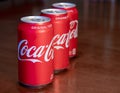 Closeup View of Several Cans of Coca Cola