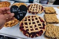 Baked goods at outdoor agriculture fair.