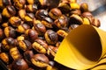 A closeup view of some roasted chestnuts in Navona Square, Christmas, Rome, Italy