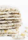 Closeup view of stacked Puffed rice cakes on white background (bread substitution)