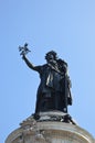 Closeup view of statue of Liberty in Place de la Republique in Paris with blue sky in bacground