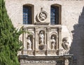 Closeup view of statues above the entrance door of the San Gil and Santa Ana Church in Granada, Spain Royalty Free Stock Photo