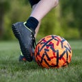 Closeup view of a teenagers foot about to kick a soccer ball Royalty Free Stock Photo