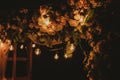 Closeup view of top of beautiful floral night wedding decorations