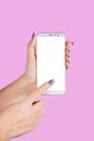 Two female hands holding white modern smartphone Royalty Free Stock Photo