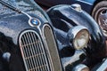 Closeup view of vintage six-cylinder sports sedan car BMW 335 released circa 1939-1941 in Germany with visible wet hood