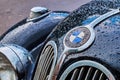 Closeup view of vintage six-cylinder sports sedan car BMW 335 released circa 1939-1941 in Germany with visible wet hood