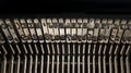 Closeup view of vintage typewriter keys in revers with visible ink