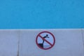 Closeup view of warning sign on outdoor swimming pool. Royalty Free Stock Photo