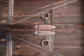 Closeup view of wooden brown door with metal handles Royalty Free Stock Photo
