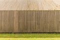 Closeup view of wooden slat wall and pitched roof of building Royalty Free Stock Photo