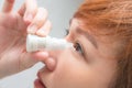 Closeup view of young asian woman applying eye drop. artificial tears Royalty Free Stock Photo