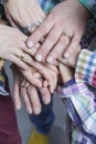 Closeup View of Young Caucasian People Connecting Their Hands Together