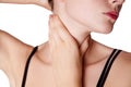 Closeup view of a young woman with pain on neck or thyroid gland. Royalty Free Stock Photo