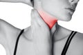 Closeup view of a young woman with pain on neck or thyroid gland Royalty Free Stock Photo