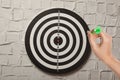 Closeup view of young playing darts Royalty Free Stock Photo