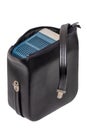 Closeup of a vintage black leather case with a portable slide projector for viewing slides and filmstripes isolated on a white Royalty Free Stock Photo