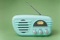 Vintage fifties style radio on green background Royalty Free Stock Photo