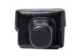 Closeup of a vintage film camera in a black leather case or cover isolated on a white background. Clipping path. Leather bag to Royalty Free Stock Photo