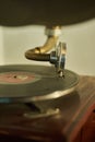 Closeup of Vintage Gramophone Playing a Dusty Record