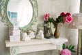 Closeup vintage interior with mirror and a table with a vase and Royalty Free Stock Photo