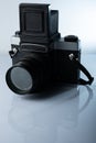 A closeup of a vintage medium format film camera against white background Royalty Free Stock Photo