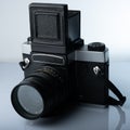 A closeup of a vintage medium format film camera against white background Royalty Free Stock Photo