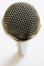 Vintage microphone over white Royalty Free Stock Photo