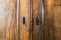 Closeup of vintage oak brown closet doors, vintage design Royalty Free Stock Photo