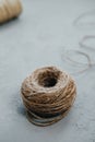 Closeup of Vintage Skein of jute twine on grey background