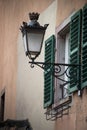 vintage street light on house facade in the street Royalty Free Stock Photo