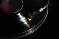 Closeup of vinyl turntable, hi-fi headshell cartridge in action, Retro gramophone playing analog disc with music. place Royalty Free Stock Photo