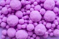 Closeup of violet balls of different sizes Royalty Free Stock Photo