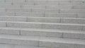 Closeup vire of grey concrete stairs with dark concrete lines on footsteps