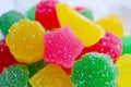 Closeup Vivid Pink Star Shaped Sugar Coated Jelly Candy on Candies Pile