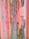 Closeup of the wall with a decorative pink colored plaster vertical lines and stripes Royalty Free Stock Photo