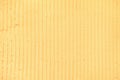 textured yellow background with plaster vertical lines and stripes Royalty Free Stock Photo