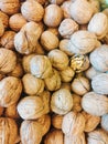 Closeup of walnuts one is cracked open Royalty Free Stock Photo