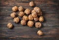 Closeup walnuts on wooden dark table