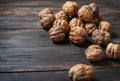 Closeup walnuts on wooden dark table