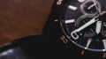 Wrist watch on wooden backgroundcloseup of watch with chronometer on wooden background