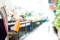 Closeup of water pulverizer in woman gardener hands Royalty Free Stock Photo