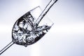 Closeup of water splashing in a glass Royalty Free Stock Photo